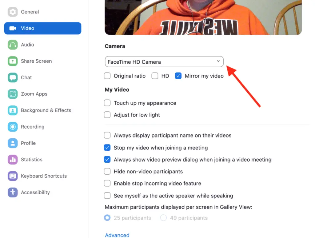 Video tab on Zoom's settings with a red arrow pointing to "camera" drop down list