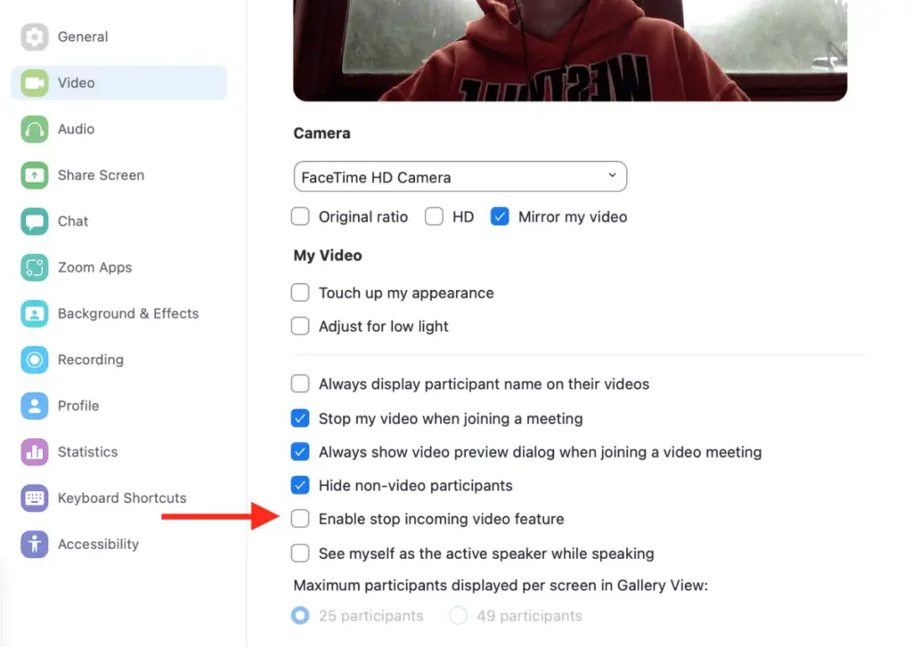 Zoom settings, video tab, with red arrow pointing to "Enable Stop Incoming Video Feature"