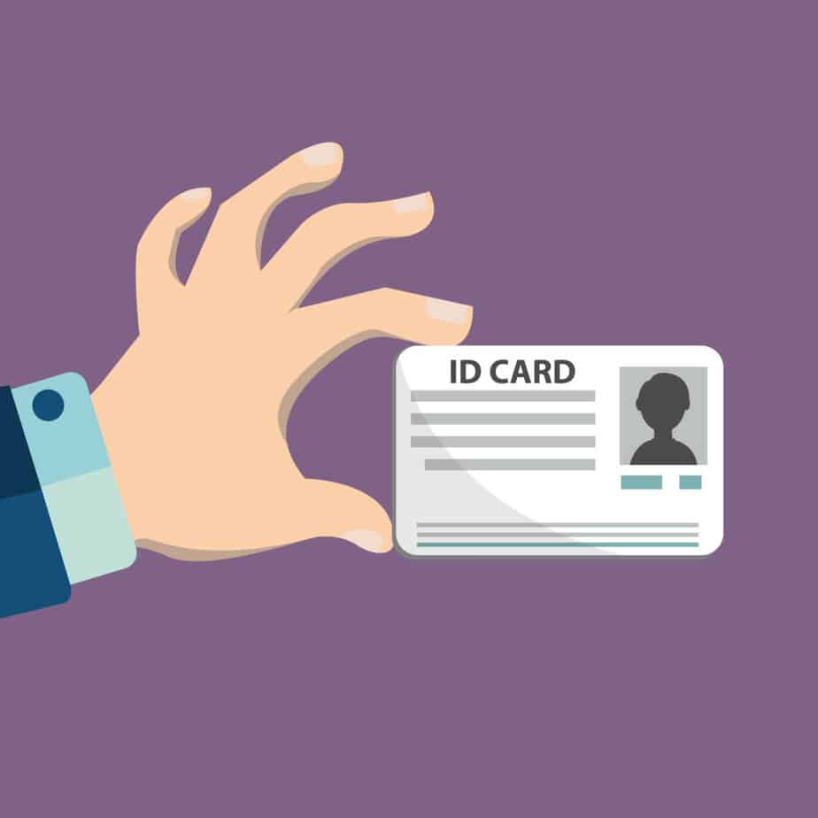 Illustration of hand holding the id card.