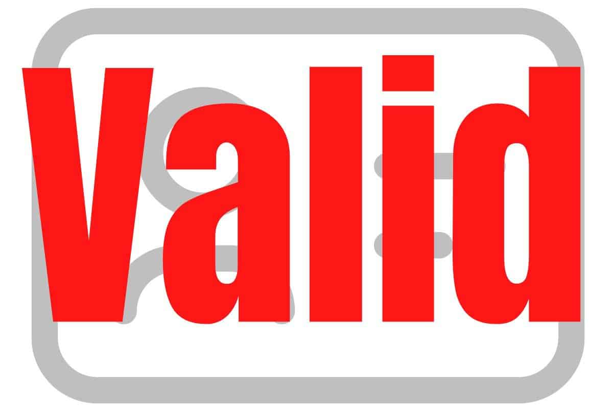 A light student ID card in the background with the word VALID written over it in red